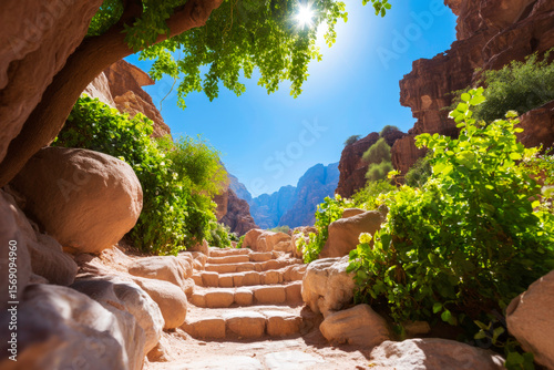 Stone steps descending into sunlit canyon adventurous hiking path