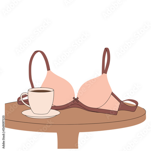Bra and cup of coffee on wooden table in minimalist style  