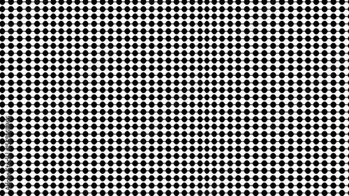 Black dots pattern on white background in repetitive design  