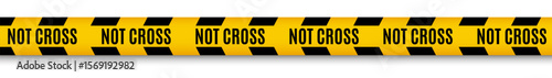 Yellow caution tape with black stripes and NOT CROSS text, used for security and restricted areas
