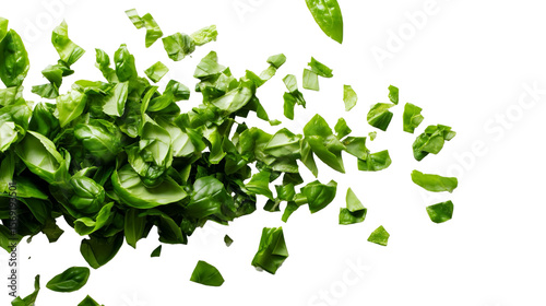 Fresh chopped basil leaves scattered on a white background, showcasing vibrant green color and natural texture, ideal for culinary or ingredient-themed visuals.