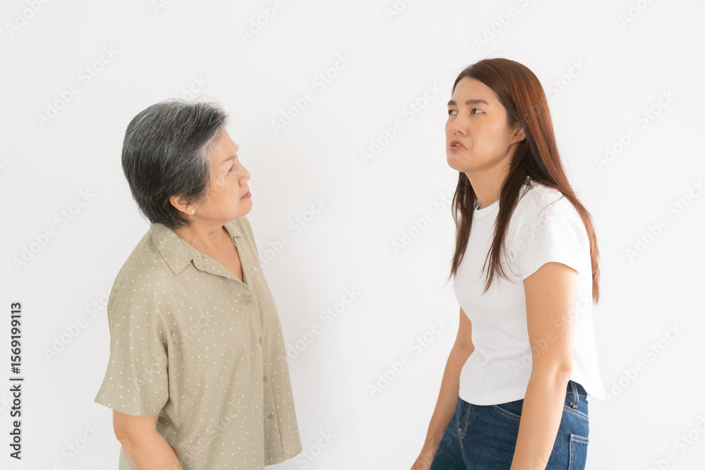 Asian Thai elder mother scolding daughter in funny facial expression isksome. Asian Thai elder mother scolding daughter in funny facial expression isksome.