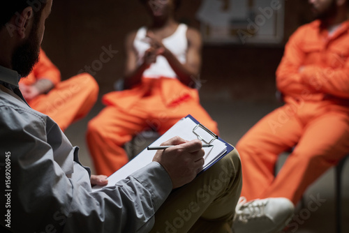 Canvastavla Group of young men of diverse ethnicities participating in group therapy session