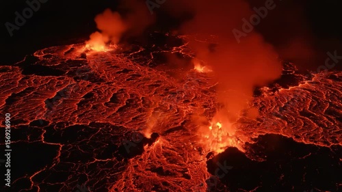 Close up view of hot burning fire flames in a dark fireplace at night