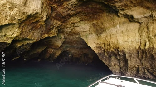 Boat Entering Magnificent Sea Cave During Coastal Tour Near Benagil Beach Portugal