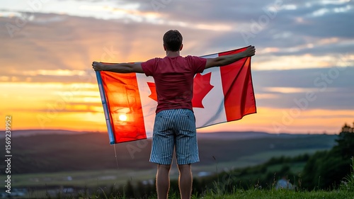 Wallpaper Mural person holding canadian flag at sunset with scenic landscape and open sky
 Torontodigital.ca