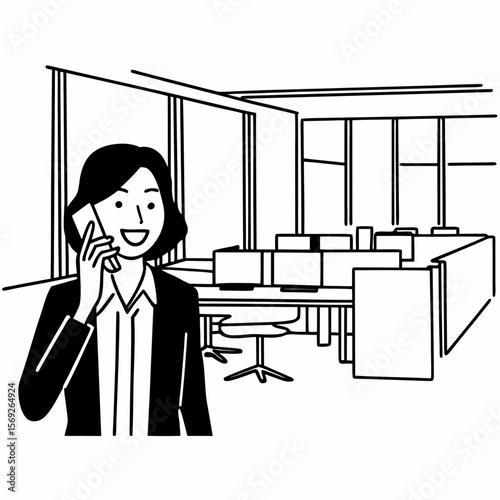 Smiling businesswoman using phone in office