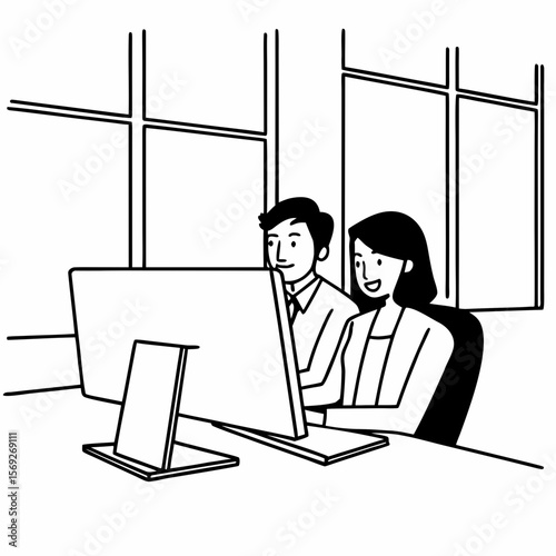 Two corporate professionals working together on computer