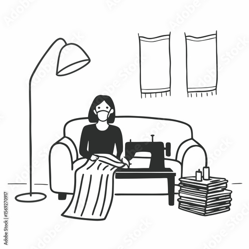 Woman sewing face mask for covid at home