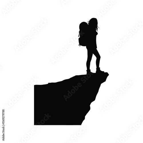 Silhouette of a female hiker with backpack standing on a cliff edge adventure travel exploration