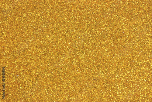 A shimmering gold glitter texture background.