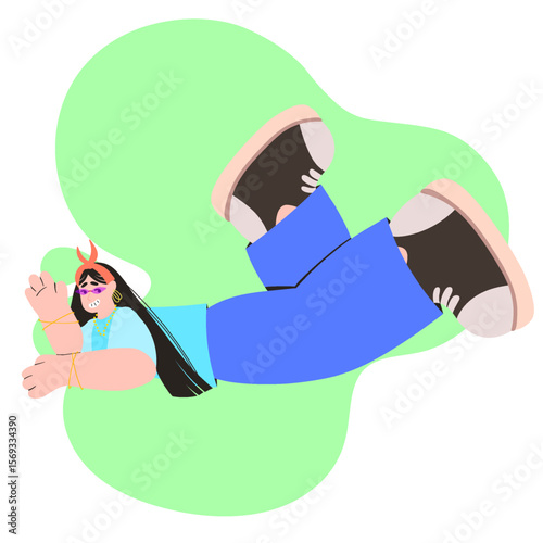 Girl lying on stomach with legs raised wearing blue pants and turquoise shirt with long black hair and red headband