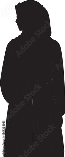 Silhouette of a woman in headscarf wearing long coat and facing sidewaysk