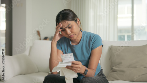Cost of living low poor budget income black asia people Gen Z young adult woman. Looking opening Past due credit card bill debt home loan money issue asian worry tired stress in raise tax rate crisis.