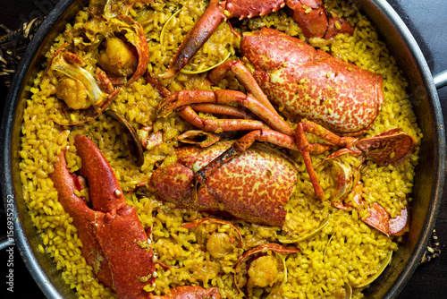 Spanish seafood paella with lobster, prawns and Mediterranean rice