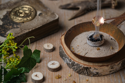 Tableau sur toile Incense ritual at wheel of the year festival Samhain with frankincense, myrrh an