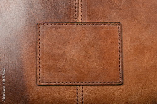 Stitched brown leather square patch