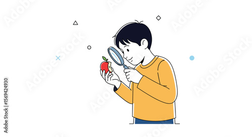 Curious young boy with magnifying glass examines a small red object with great interest and focus