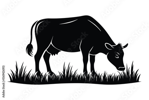 Black silhouette of cow grazing in grass against the white background reveals a transparent backdrop