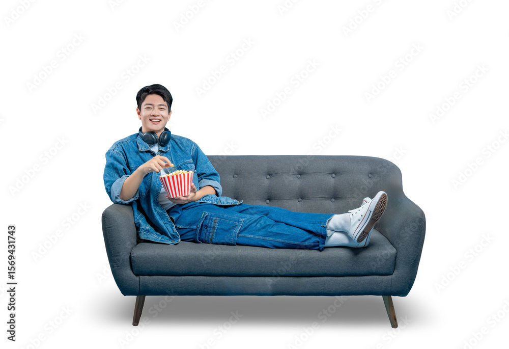 PNG,A relaxed young man lounging on a sofa reaches for popcorn while watching a movie or TV show.
PNG,A relaxed young man lounging on a sofa reaches for popcorn while watching a movie or TV show.