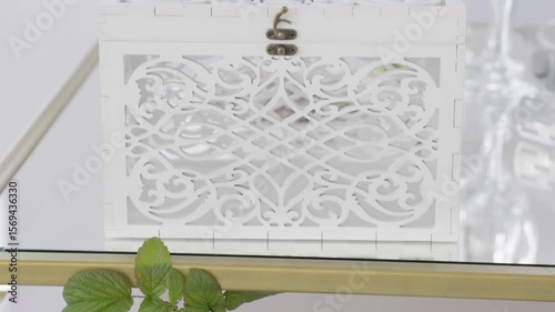 White wooden carved money box