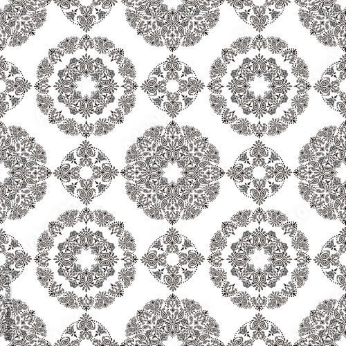 Seamless pattern composed of ornaments in a circle,