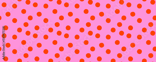 Seamless pattern background with orange dots on pink. Vector confetti polka dot texture, simple and playful abstract print. Perfect for fabric, wrapping paper, wallpaper, branding. Drag to swatches.