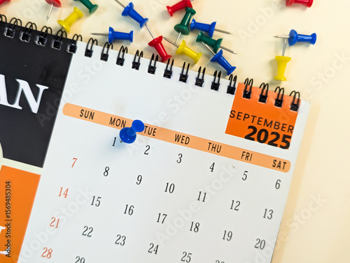 1st september marked with push pin on calendar 2025
