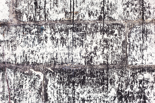 Old brick black color wall background. Dark stone texture