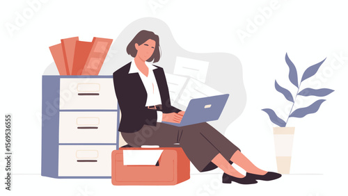 Woman in business attire sits on a file box using a laptop near a filing cabinet and a plant pot