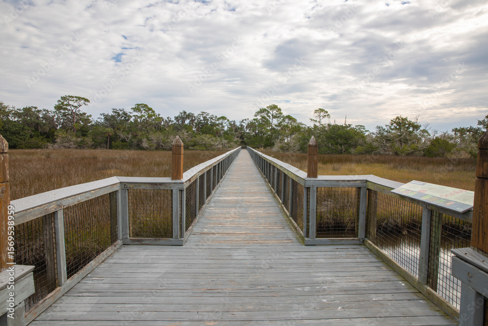 Fototapeta premium A boardwalk over the salt marsh at Fort Mose Historic State Park