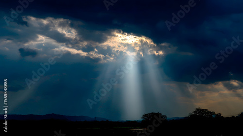 Heavenly light bursts forth, the clouds dispersing to create a sparkling trail marking Christ's glorious comeback