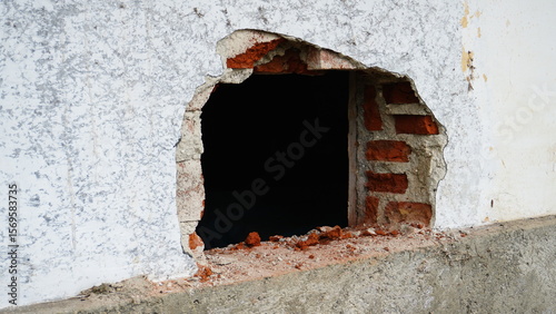 Closed Iron Door on Concrete Wall – Urban Texture and Industrial Detail