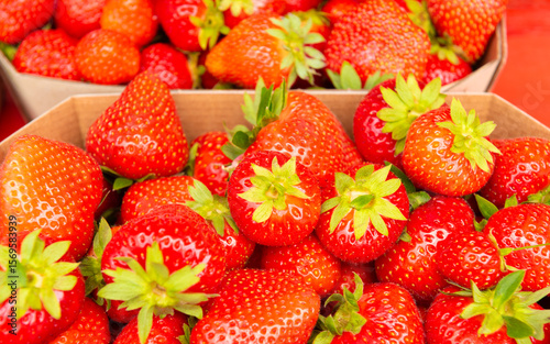 strawberries in eco-friendly paper boxes for sale.