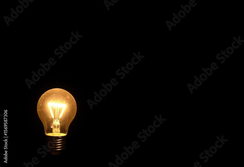 Glowing lightbulb on dark background, signifying innovative ideas, illumination, clever