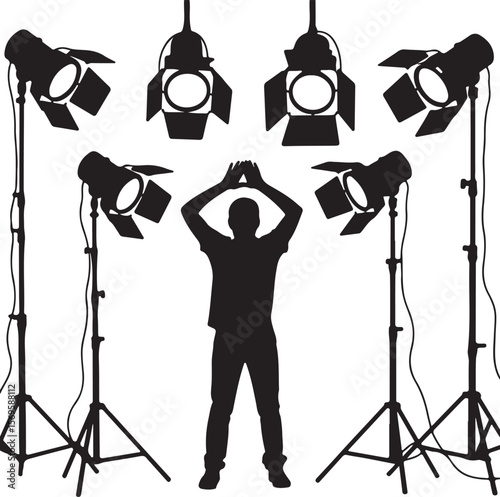 Person silhouette surrounded by studio lights lighting equipment photography