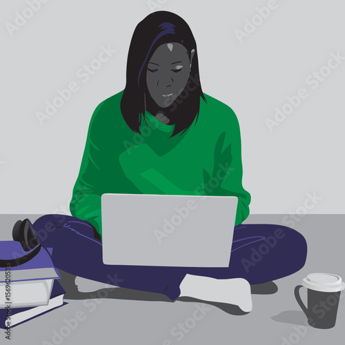 Woman studying on laptop with books and coffee on floor