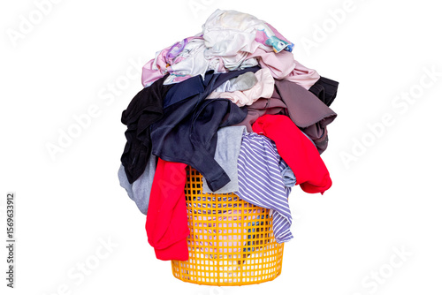 Overflowing laundry basket filled with colorful clothes and fabric. Concept of household chores, laundry day, messy home, or cleaning routine. Isolated on transparent background
