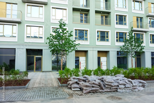 Improvement of the courtyard of an apartment building in the city. Daytime in summer.