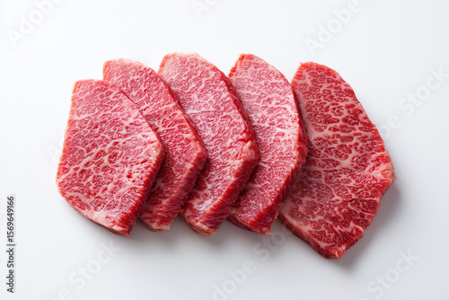 High marbling score beef sliced isolated on white background, Selective focus wagyu beef with fatty marbling on white background, Korean hanwoo beef for barbecue.
