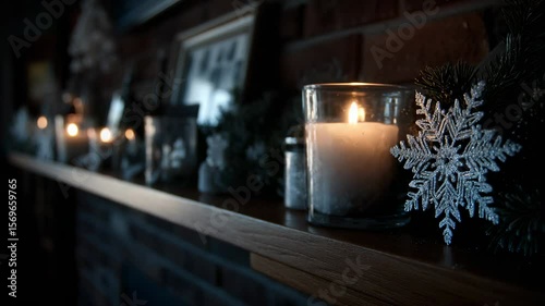 Elegant winter decorations with candles and snowflake embellishments on a rustic wooden mantle