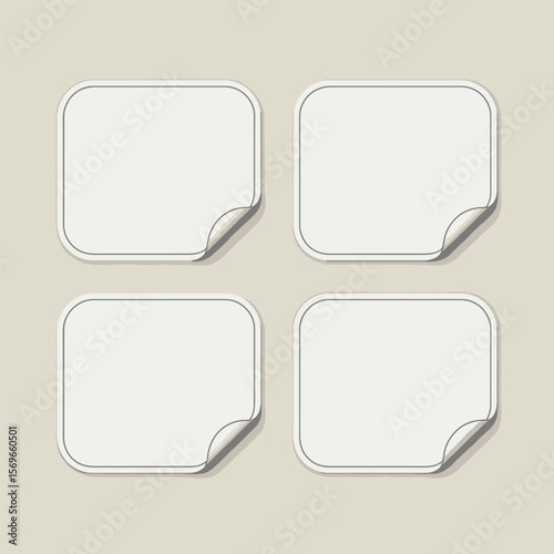 Four Blank White Rectangular Stickers or Labels