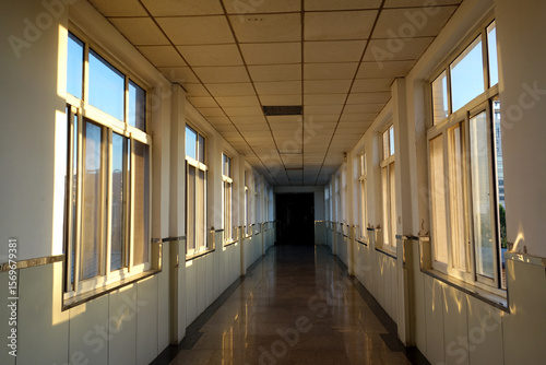 The hospital corridors and windows at sunrise in the early morning