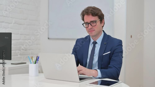 Coughing Mature Adult Businessman at His Desk