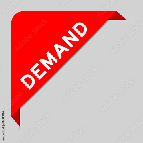Red color of corner label banner with word demand on gray background