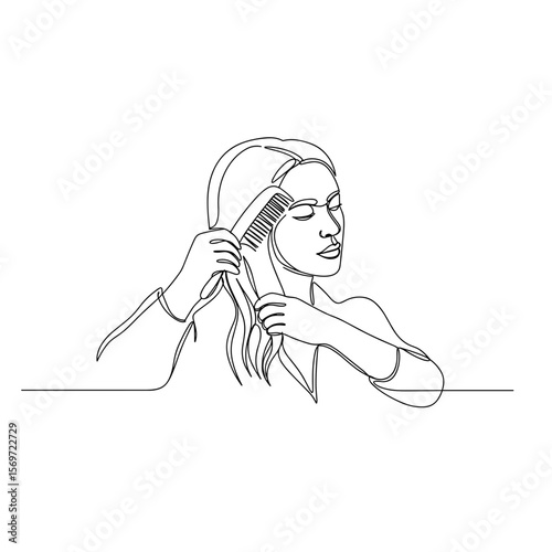 Young woman combing her hair with a brush in a minimalist style  