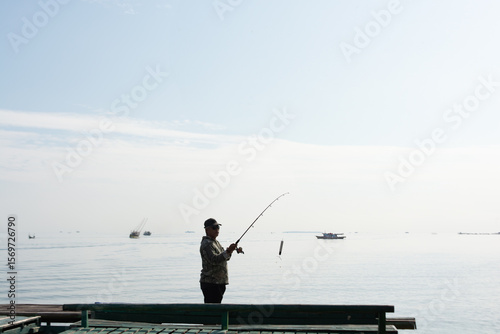 Fisherman on the seashore