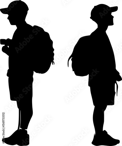Silhouette of two young tourists with backpacks, one holding a camera, enjoying their vacation