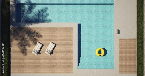 Aerial view of a modern swimming pool with clear blue water, wooden deck with two loungers, yellow inflatable ring floating, and surrounding patio. Perfect spot for summer relaxation and leisure