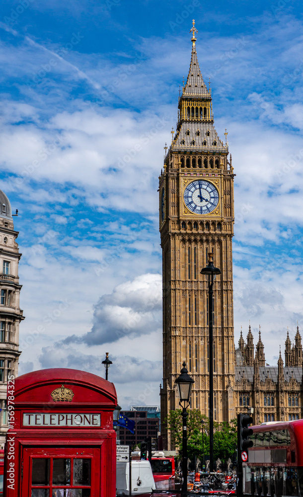 Obraz premium big ben city of london with red telephone booth in England vertical